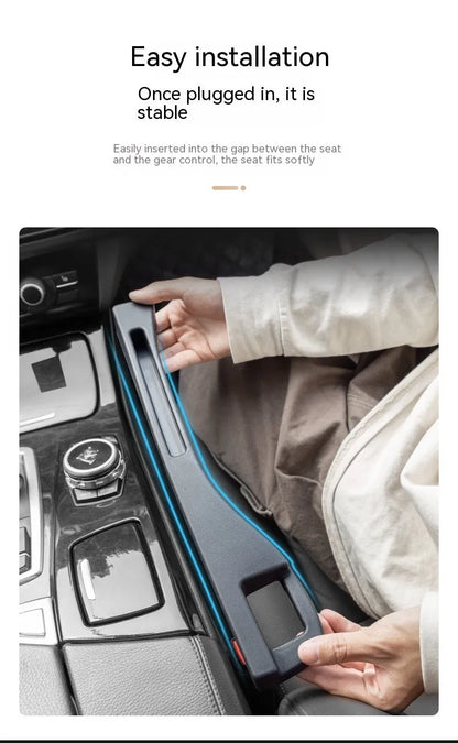 Black car seat gap storage box organiser pocket placed between vehicle seat and centre console