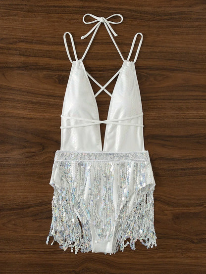 White one-piece swimsuit with deep V-neck and tassel detail, sleeveless brief style.