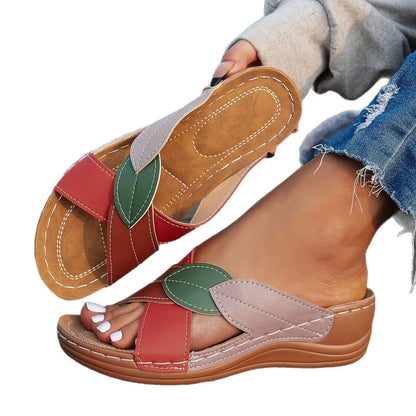 Women's black peep-toe slippers with cross-strap and thick polyurethane sole