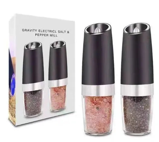 Modern electric gravity pepper grinder in matte black with adjustable ceramic mill and blue LED light on.