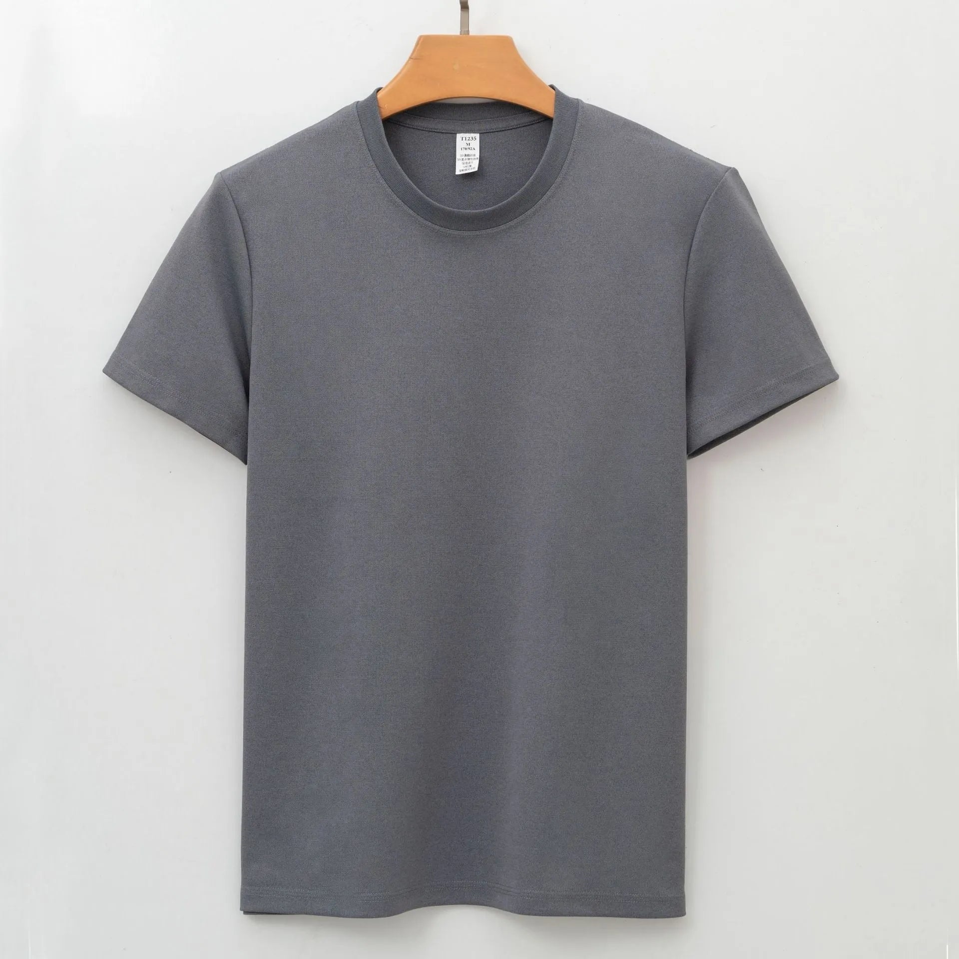 Men's solid colour antibacterial quick-dry short sleeve T-shirt on a hanger.