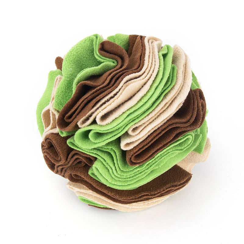 Soft and interactive puzzle ball toy made of polar fleece for dogs and cats to sniff and forage for hidden treats