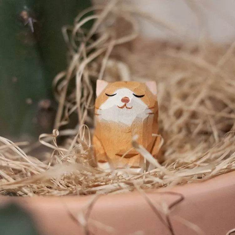 Handmade green sandalwood kitten ornament with unique design