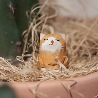 Handmade green sandalwood kitten ornament with unique design