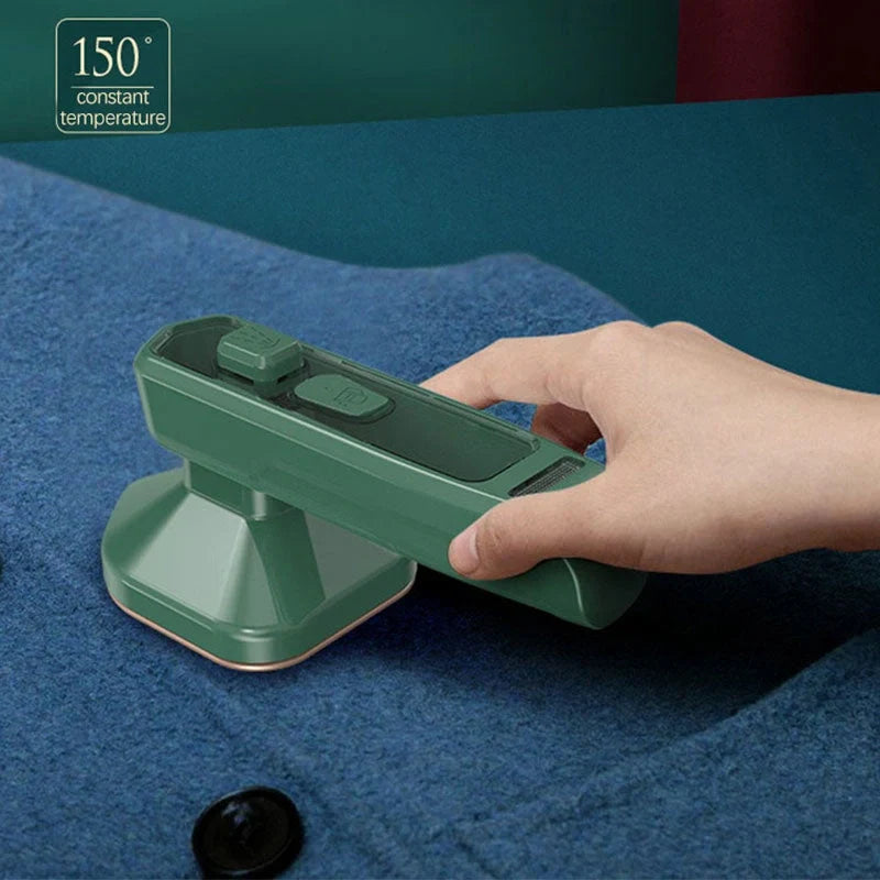 Compact green handheld garment steamer for quick ironing and cleaning
