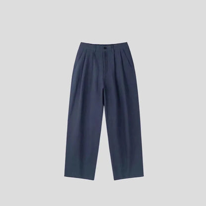 Men's apricot cotton linen trousers with elastic waistband and pencil leg opening on hanger