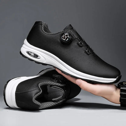 Low-top black mesh casual tennis shoes with cross shoulder straps and white composite sole