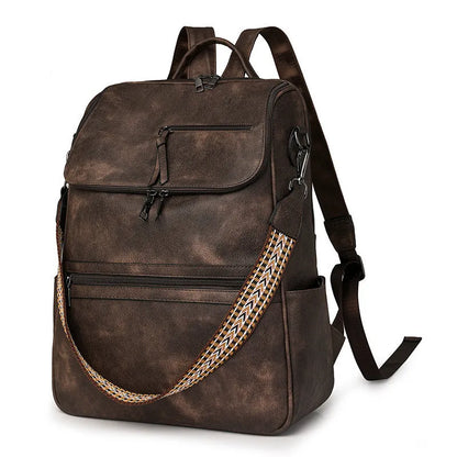 Retro college student backpack with curved shoulder straps in multiple colour options including black, blue, and yellow apricot