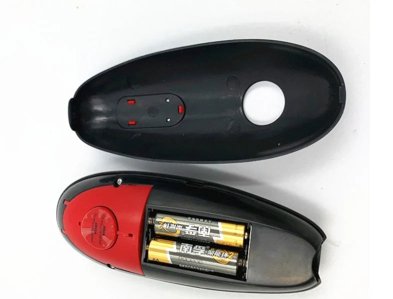 Cordless electric can opener with automatic stop and safety grooves