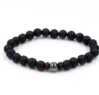 Stylish men's bracelet made with natural volcanic stone, flash stone, and wood chip in a geometric, mosaic-like design