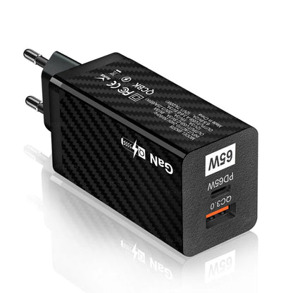 White or black GaN 65W universal laptop charger with USB-C port and compact design next to EU and US plugs