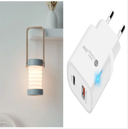 White foldable USB rechargeable LED night light in both table lamp and tall lantern modes.