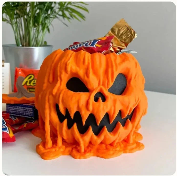 Spooky Halloween pumpkin-shaped candy bowl with lid, made of durable PVC for reusable and easy-to-clean trick-or-treating display