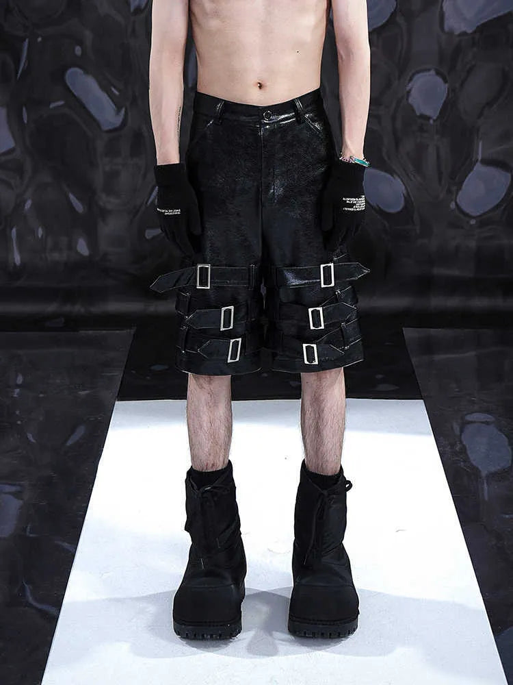 Men's black PU leather cropped pants with medium low waist, made from 100% polycarbaminate fibre, showing front view