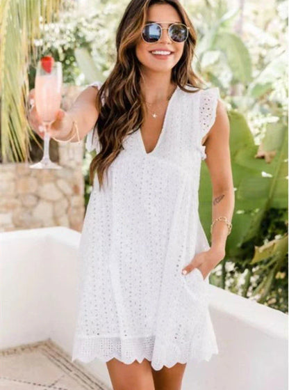A sleeveless summer dress with a unique jacquard design, lace details, and pockets in various colors