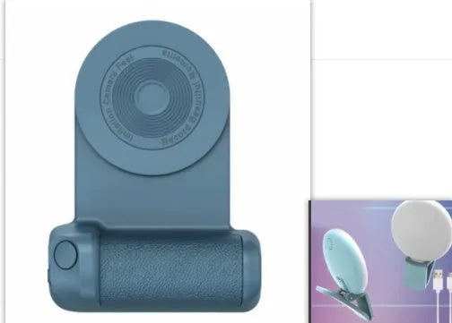Black magnetic phone camera grip holder with rotatable stand on a table next to a smartphone.