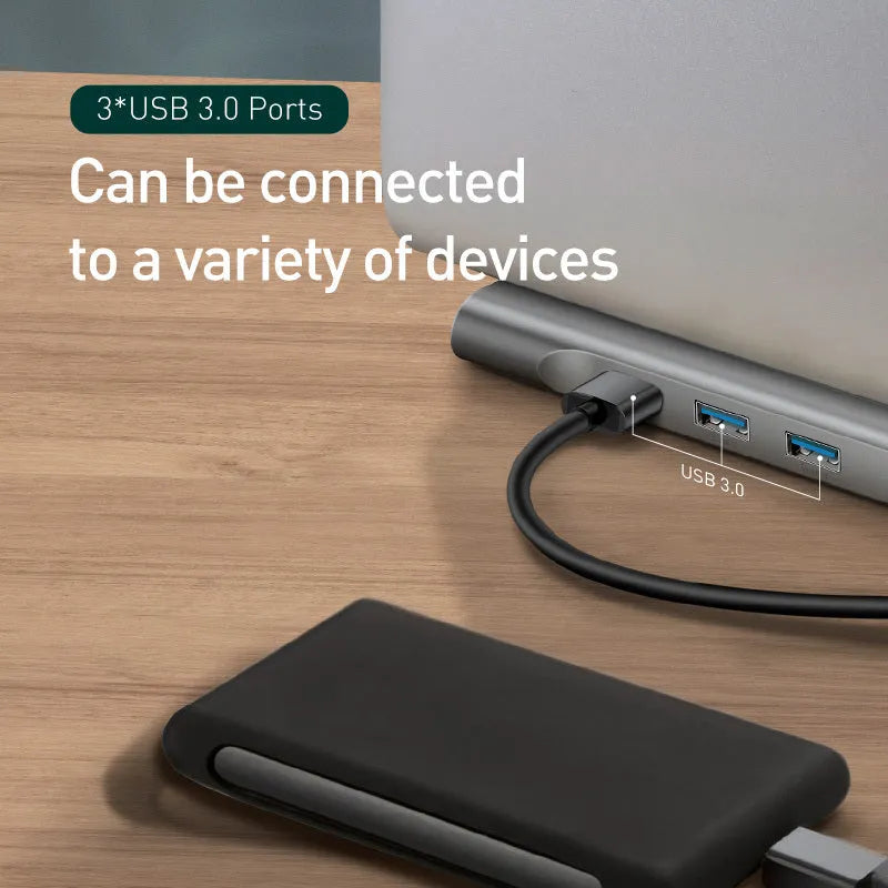 Grey aluminium alloy ten-port docking station with cooling bracket showing HDMI, VGA and USB ports