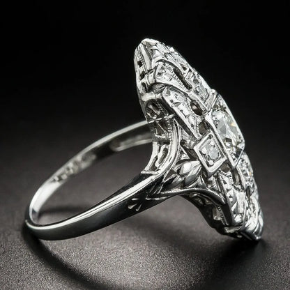 Hollow geometric ring with diamond-studded design in electroplated silver finish