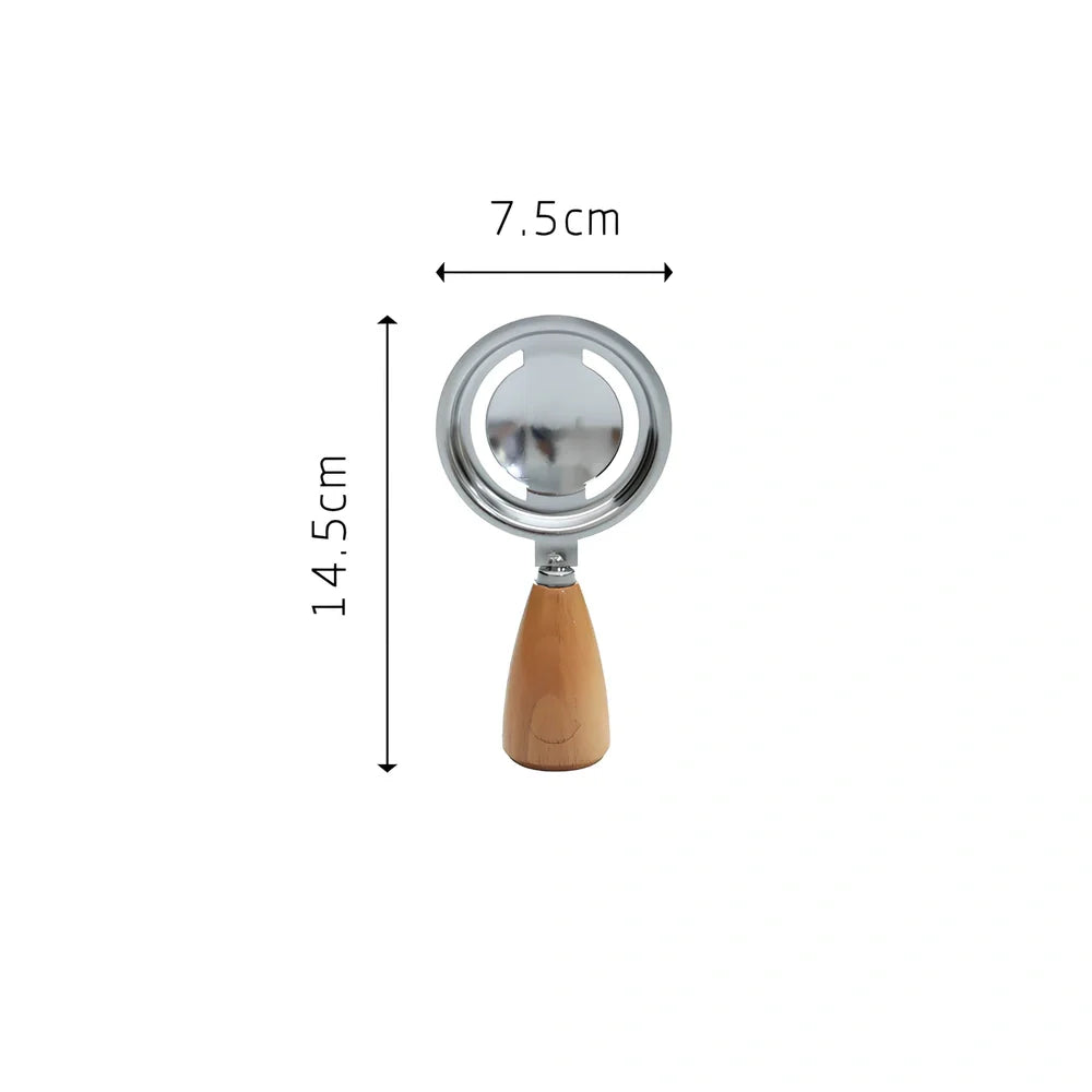 Twelve-piece stainless steel kitchen tools with beech handles and smiley motifs on a kitchen counter