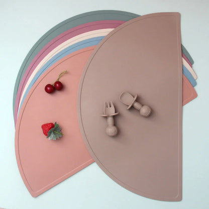 Premium Silicone Children's Placemat in various colors, featuring a modern and durable design for easy cleanup