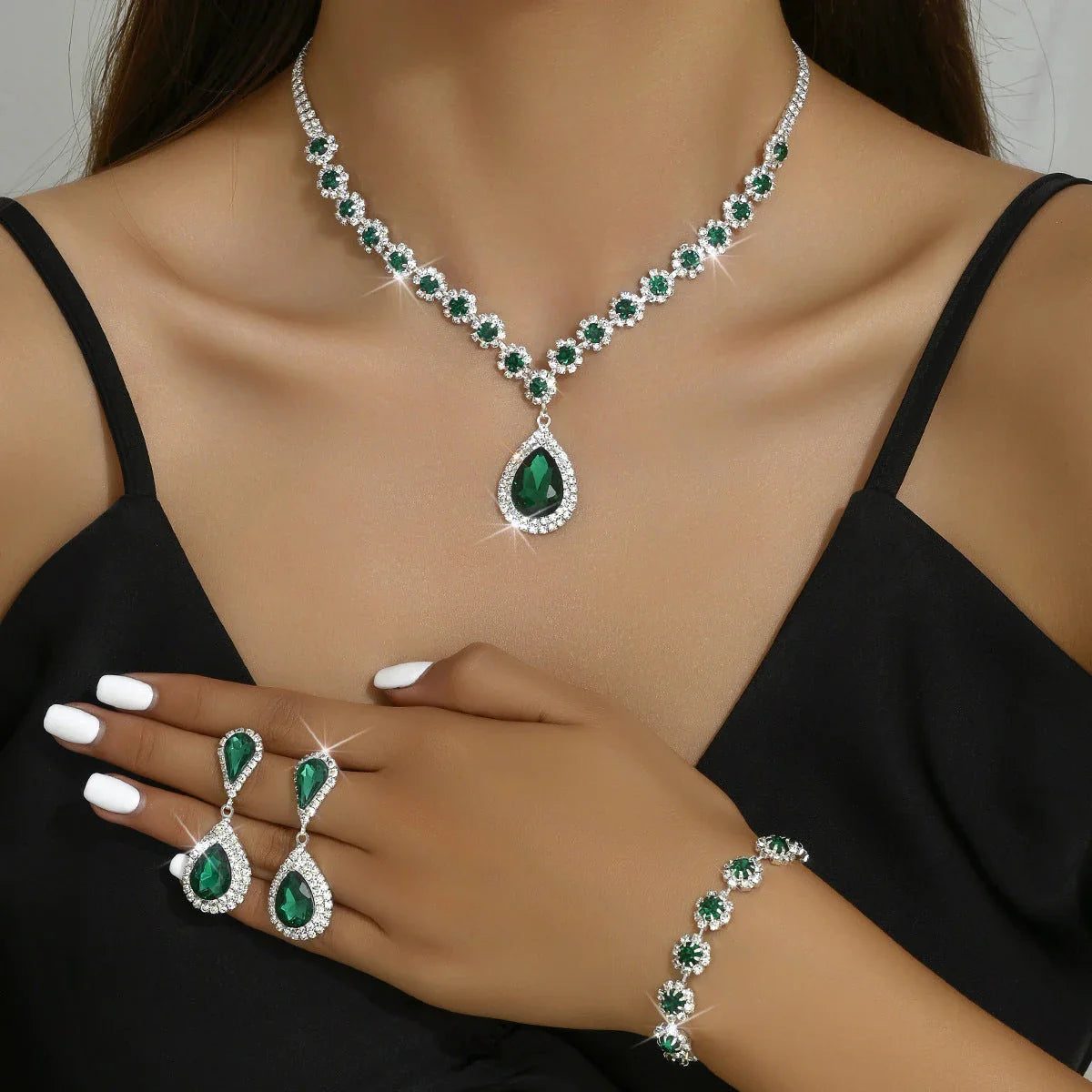 Elegant bridal jewelry set with necklace, earrings, and bracelet in various colors including white, blue, red, and green