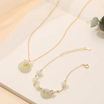 Sterling silver necklace with orchid pendant and safety buckle closure