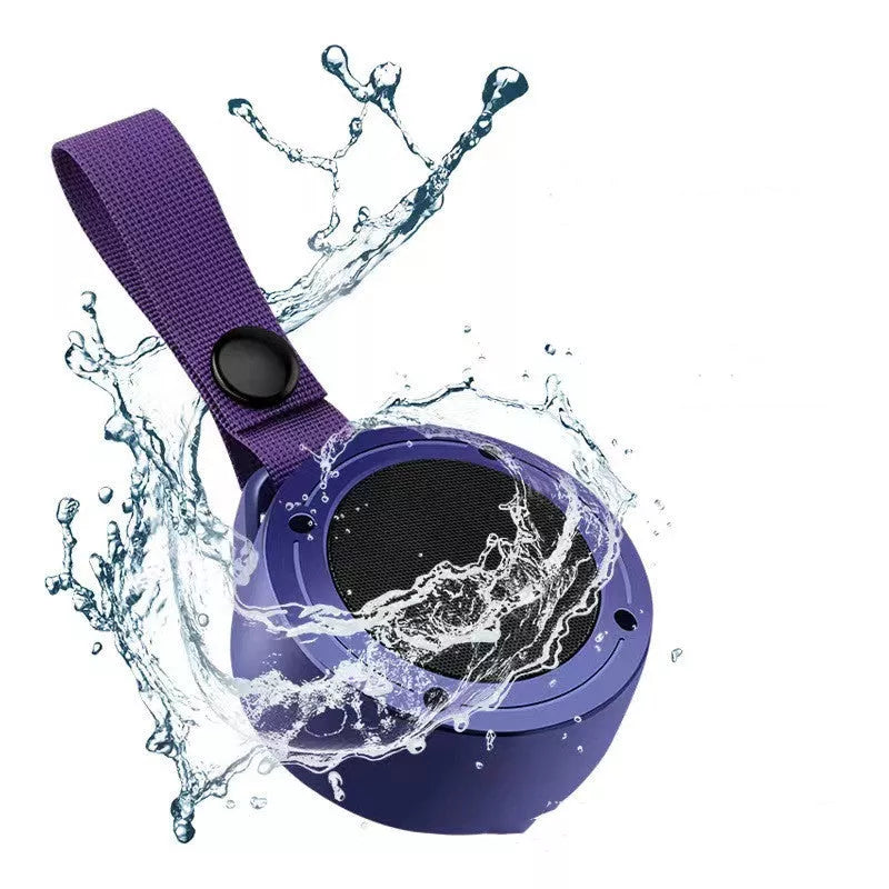 Portable Bluetooth speaker with colored lights and waterproof design
