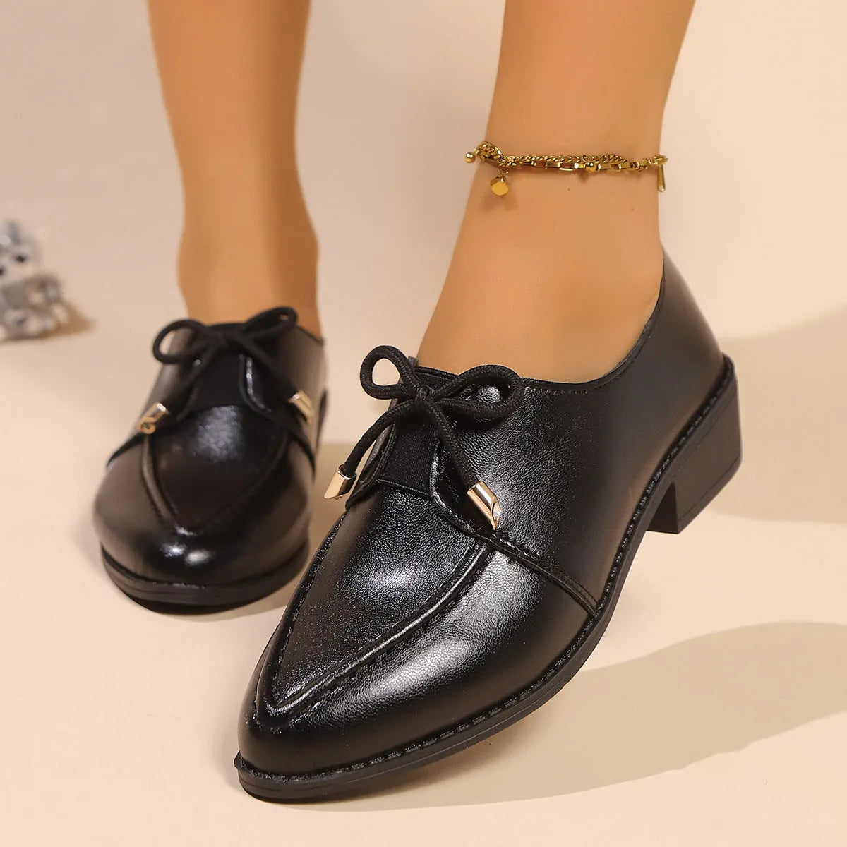 Women's British-style shoes with bow decoration, PU upper, and rubber sole in available sizes 36-43