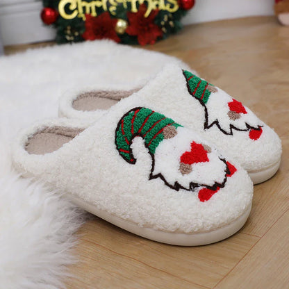 Cozy Santa Claus-themed plush slippers with soft, short-pile fabric and durable TPR soles for indoor wear and holiday cheer