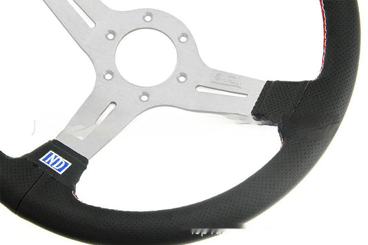 Leather-wrapped 14-inch steering wheel with middle concave shape and black or silver skeleton options