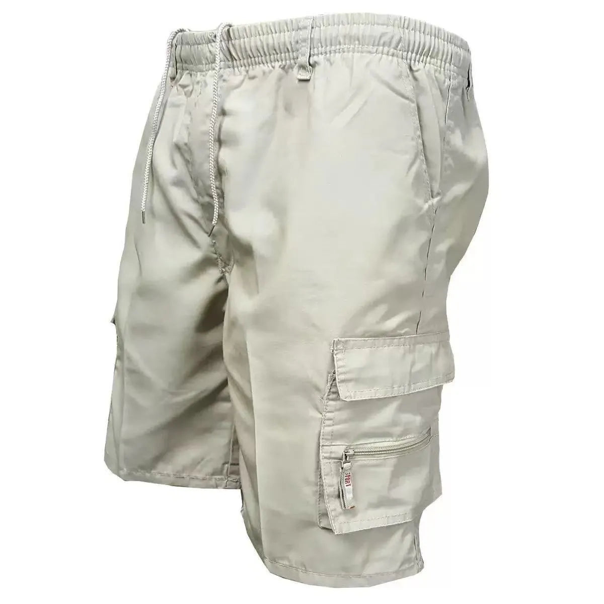 Man wearing loose-fit beige casual work pants with an elastic waistband.