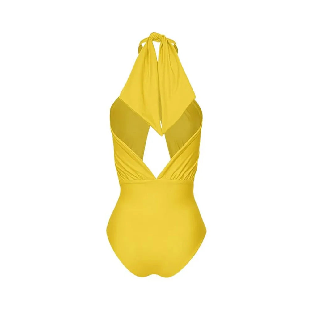 Women's solid colour halter neck swimsuit with matching wrap skirt set