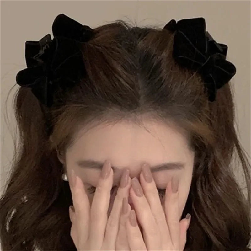 Pair of plastic hair barrettes with bow, leopard, bead and triangle styles for women's bangs