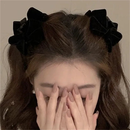 Pair of plastic hair barrettes with bow, leopard, bead and triangle styles for women's bangs