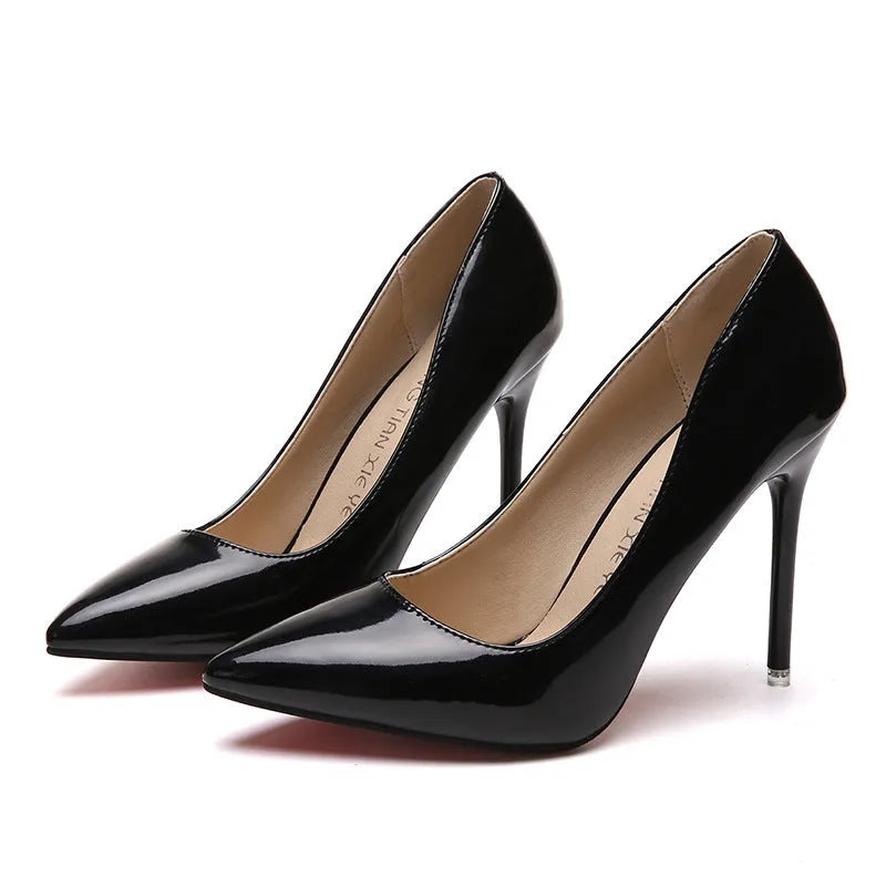 Women's pointed toe stiletto high heel pump in apricot colour with buckle detail.