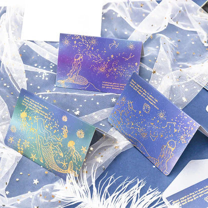 Set of three bronzing detail greeting card envelopes in cosmic colours, showing mermaid style fold.