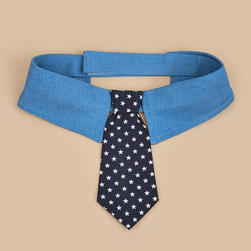 Blue denim dog collar with white star pattern, styled as an adjustable bow tie for formal pet wear.