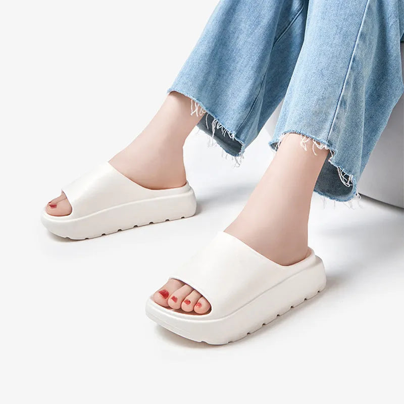 Women's beige 5.5cm thick-soled EVA slippers with injection-moulded construction for bathroom and beach use