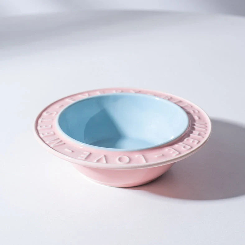 Ceramic cat bowl with iron anti-tip frame in blue colour with silicone pad