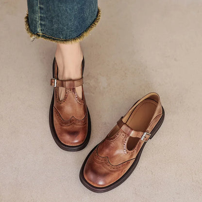 Women's sheepskin leather flat shoes with round toe in black and brown colour options