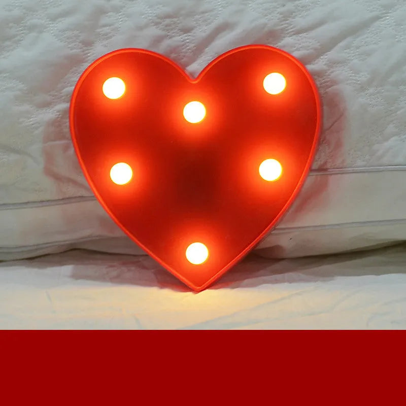 Plastic LED alphabet letter light spelling a message for a birthday or proposal.