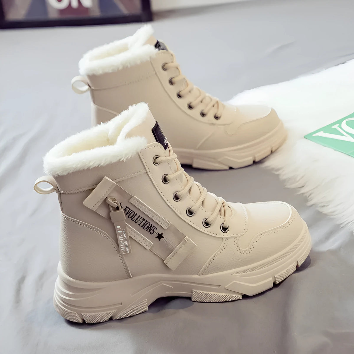 Plus size women's fleece-lined snow boot with tall crown, mid-heel, and front lace-up fastening.