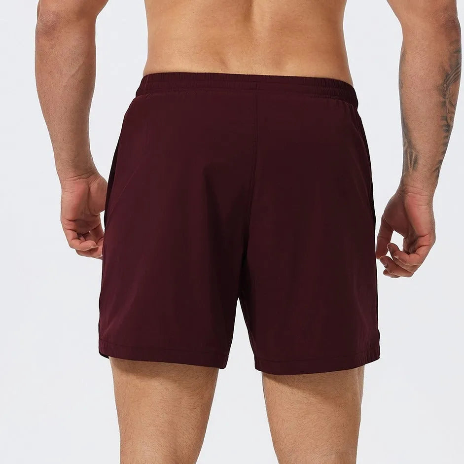 Men's black moisture-wicking nylon sports shorts for basketball, tennis, and running