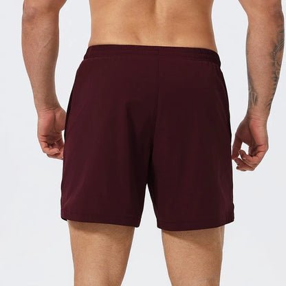 Men's black moisture-wicking nylon sports shorts for basketball, tennis, and running