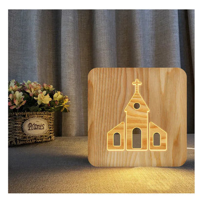 Solid wood hollow night lamp with warm white LED light on a surface