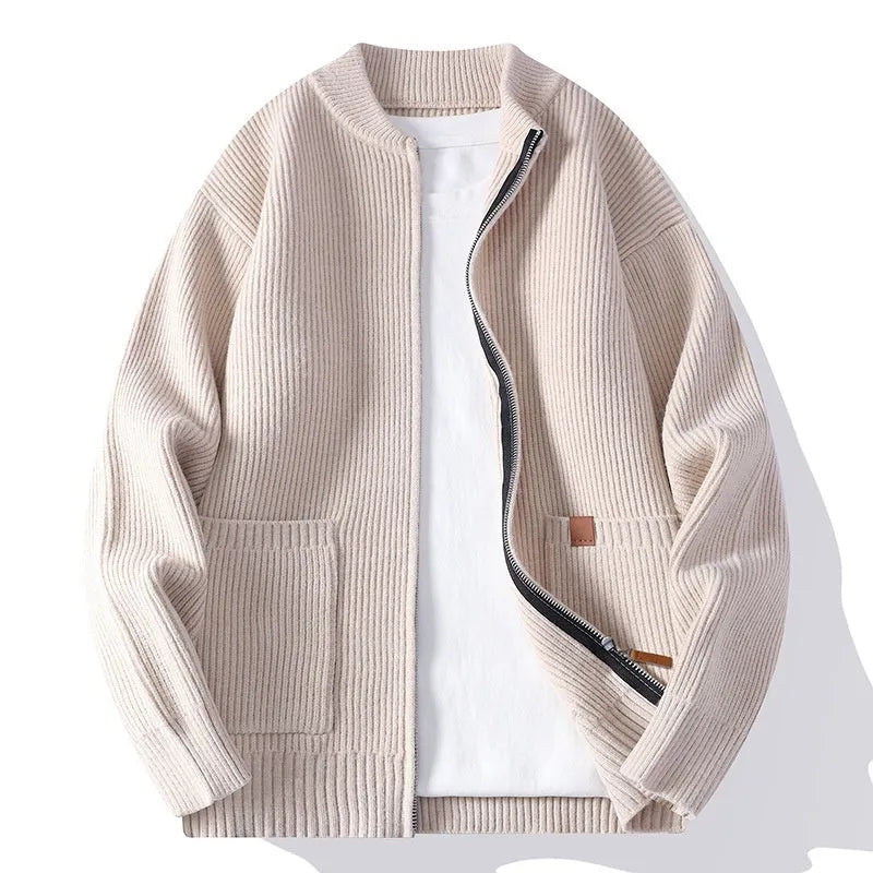 A man wearing a straight-cut, striped cardigan sweater in a beige colour.