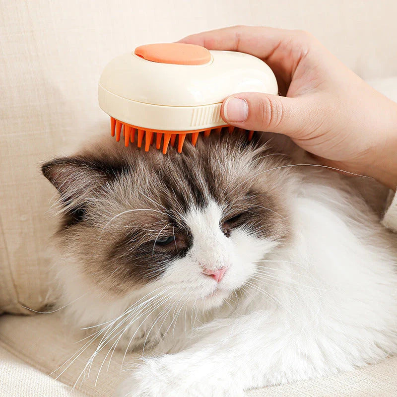Electric steam brush for cats and dogs, with rounded bristles for gentle grooming and effective hair removal