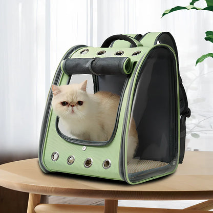 Blue pet backpack with transparent PVC windows showing interior, adjustable shoulder straps, and ventilation holes