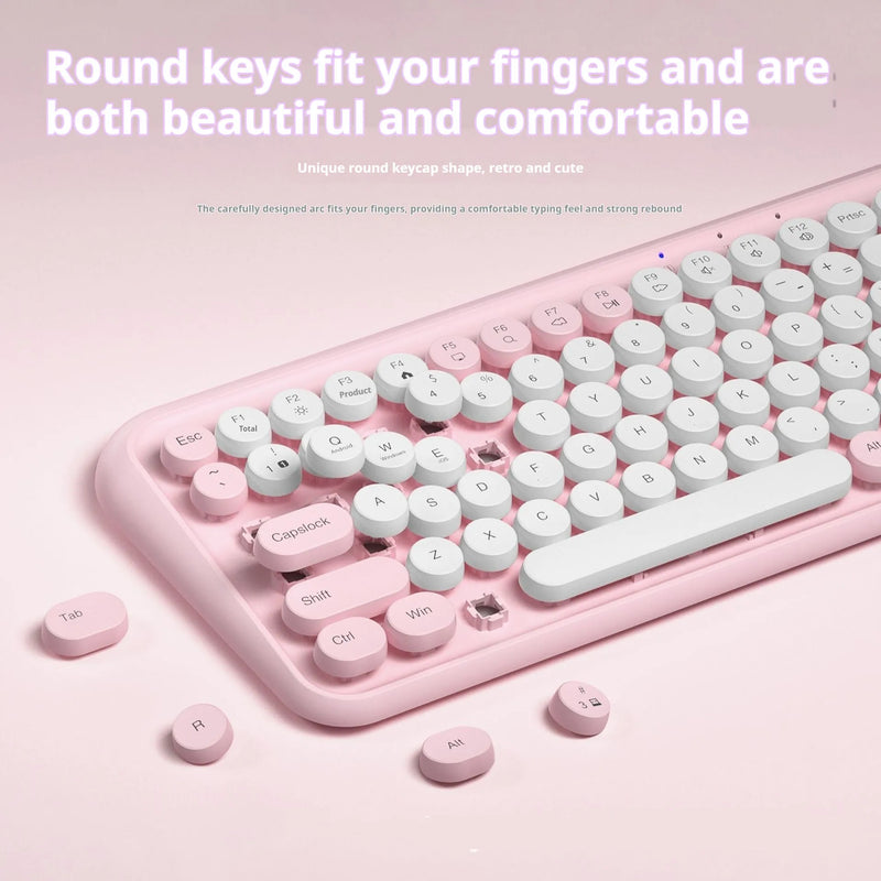 Bluetooth keyboard with 84-key layout and dual-mode wireless connectivity using ABS plastic construction measuring 339.26 × 151.44 × 30 mm for portable computer and tablet use in pink colour