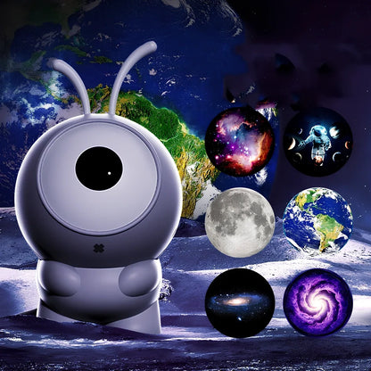 Grey ABS silicone galaxy projector showing rotating star projection on ceiling with USB cable